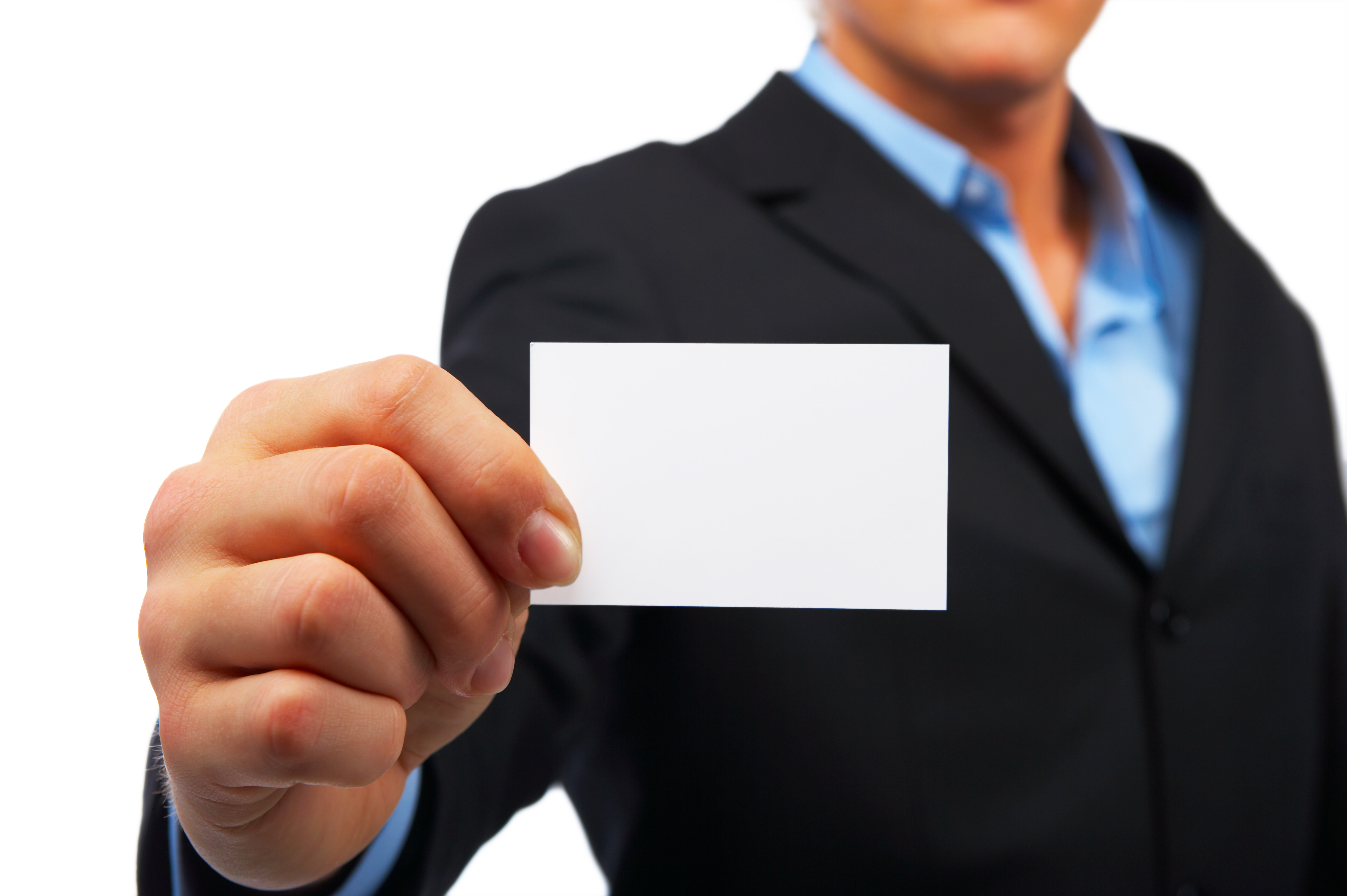 A studio shot of a businessman holding out a blank business card. Room for text, or your own message.